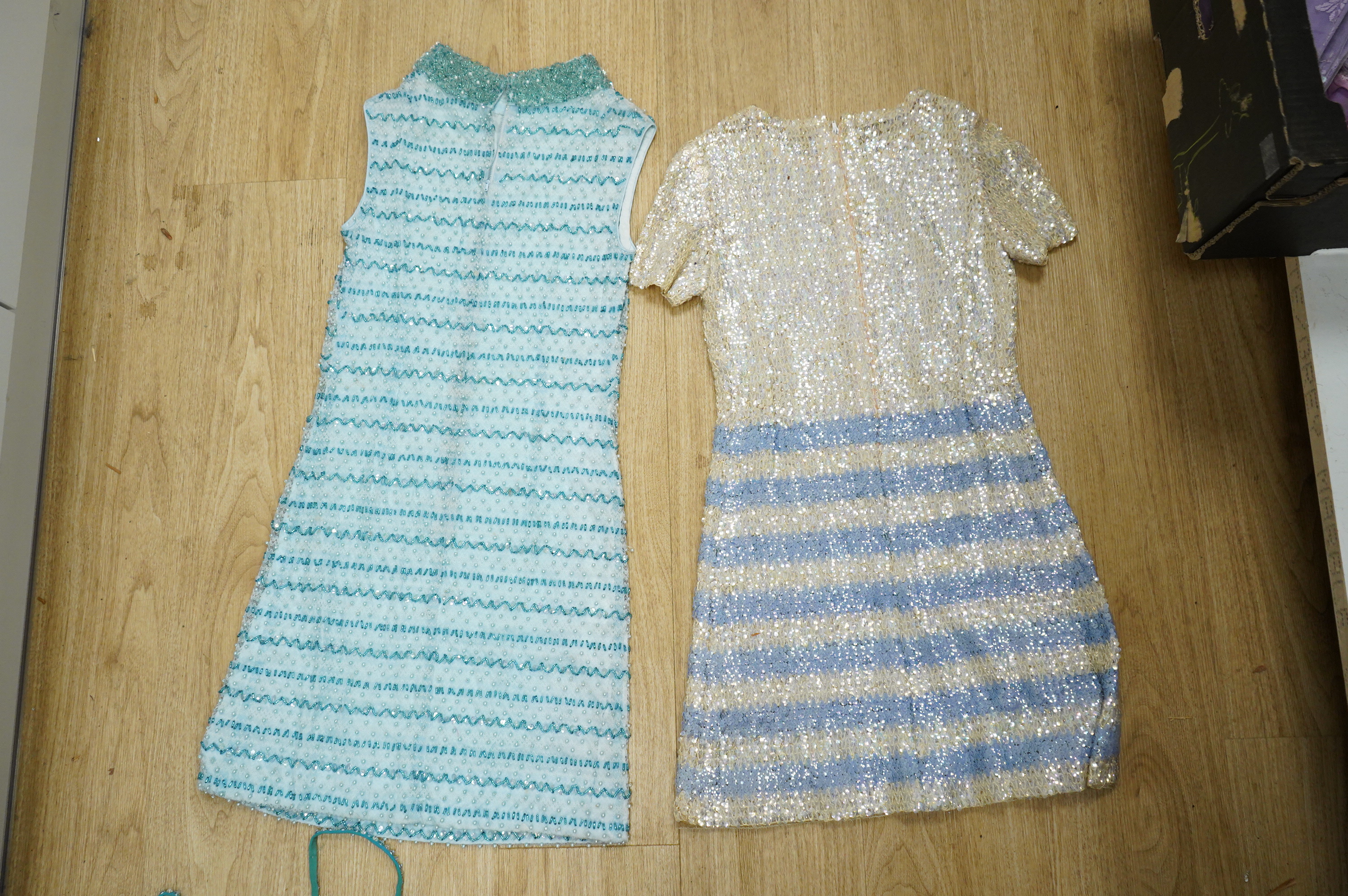 Two 1960's beaded mini dresses, a sequin top and later jumpsuit